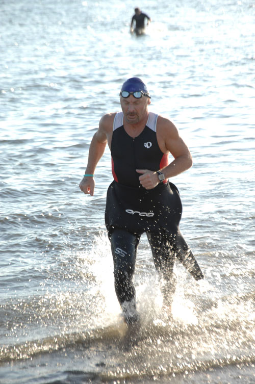 Exiting the water from the triathlon swim